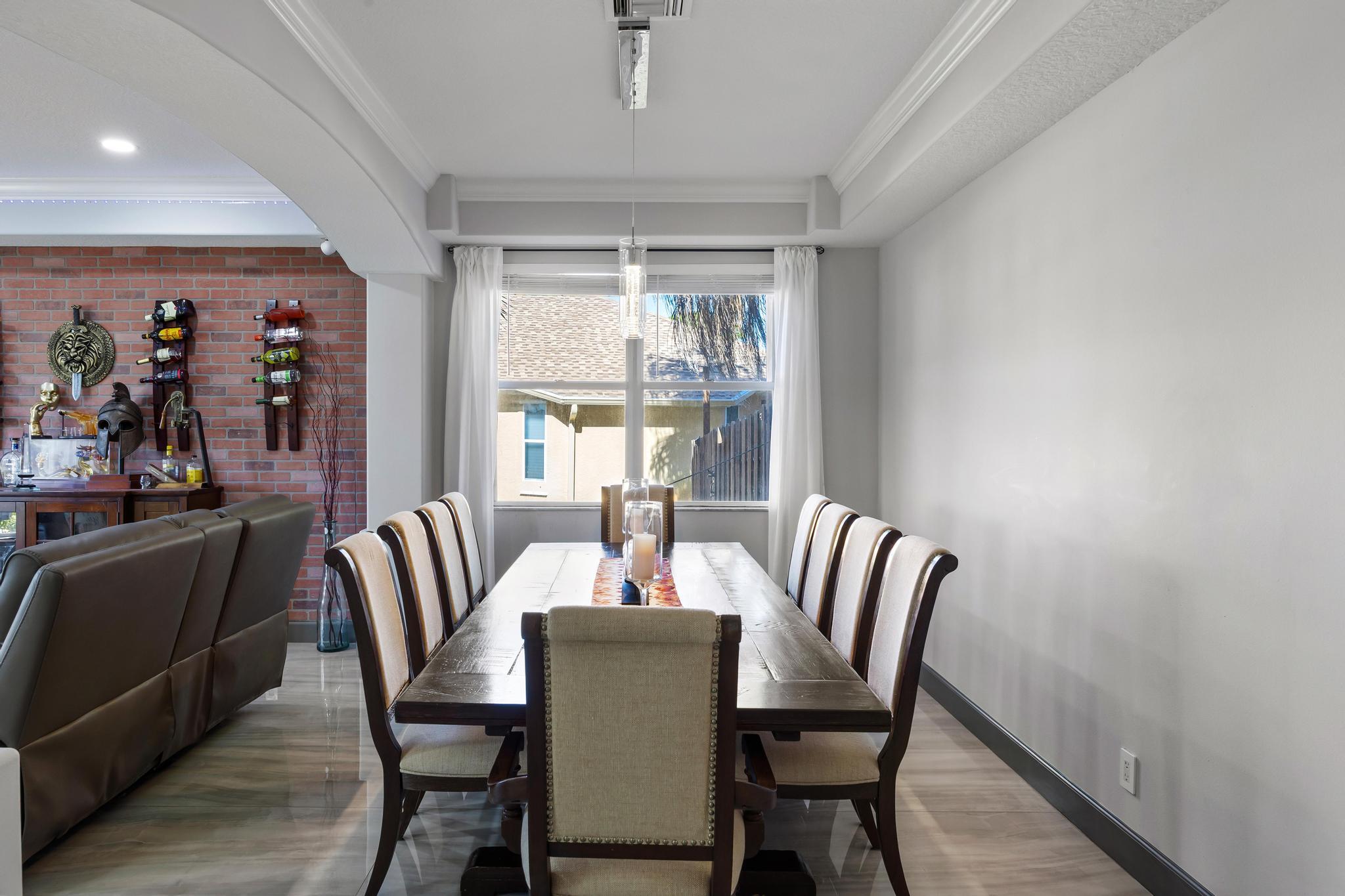 3337 Southwest Crestview Road Port St. Lucie, FL 34953 - Photo 11 of 86 a view of a dining room with furniture window and outside view