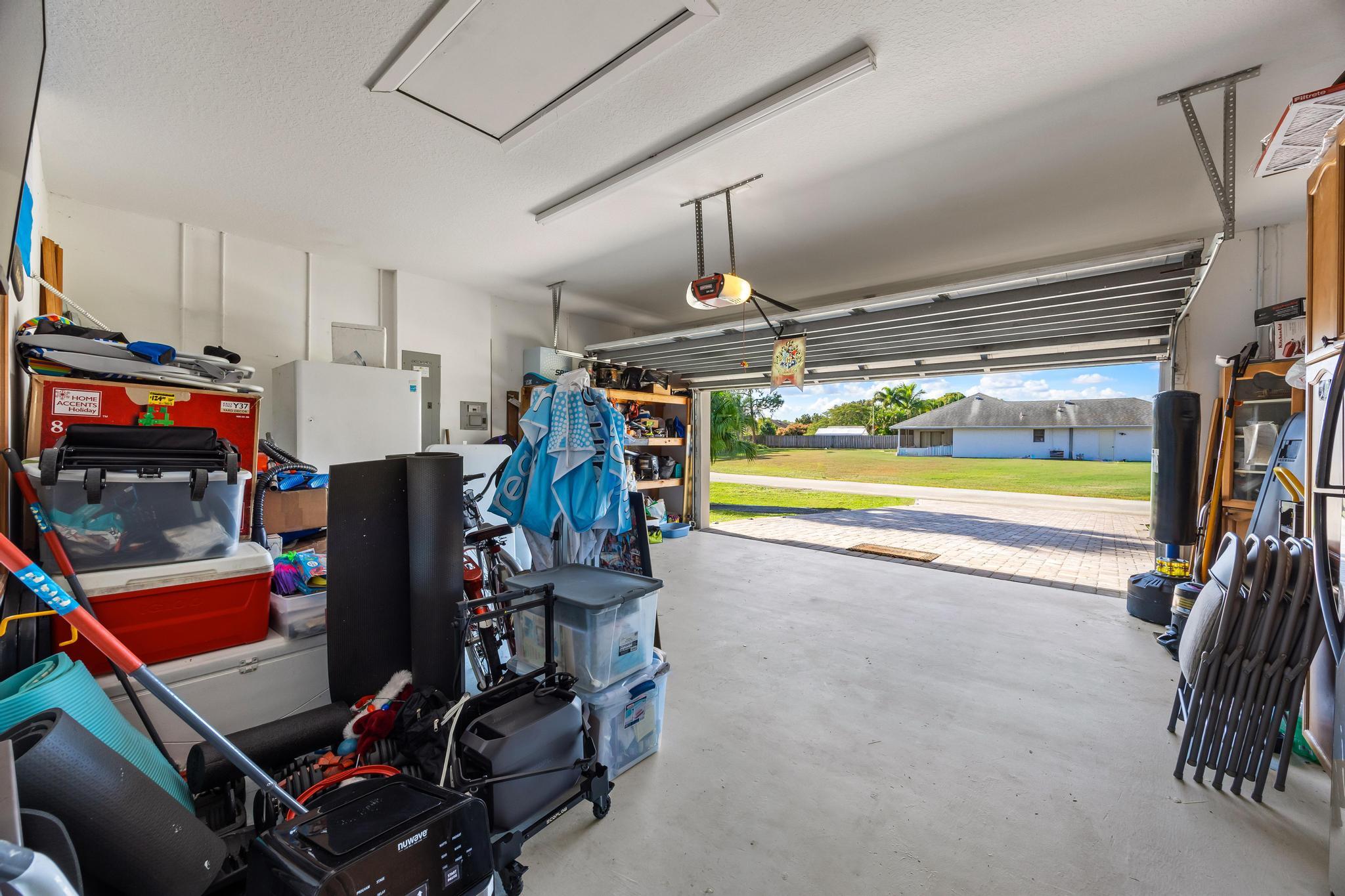 3337 Southwest Crestview Road Port St. Lucie, FL 34953 - Photo 24 of 86 a view of a room with gym equipment