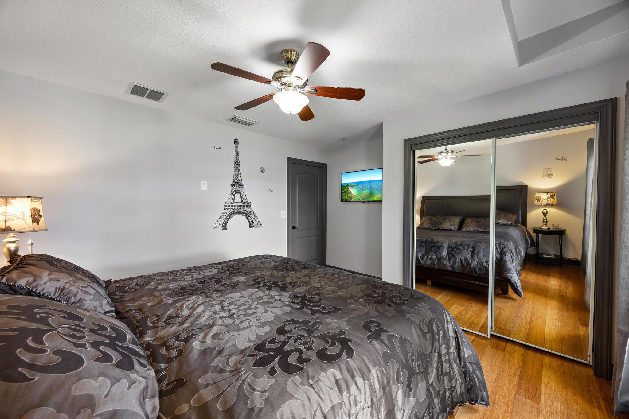 3337 Southwest Crestview Road Port St. Lucie, FL 34953 - Photo 35 of 86 a bedroom with a bed and a walk in closet