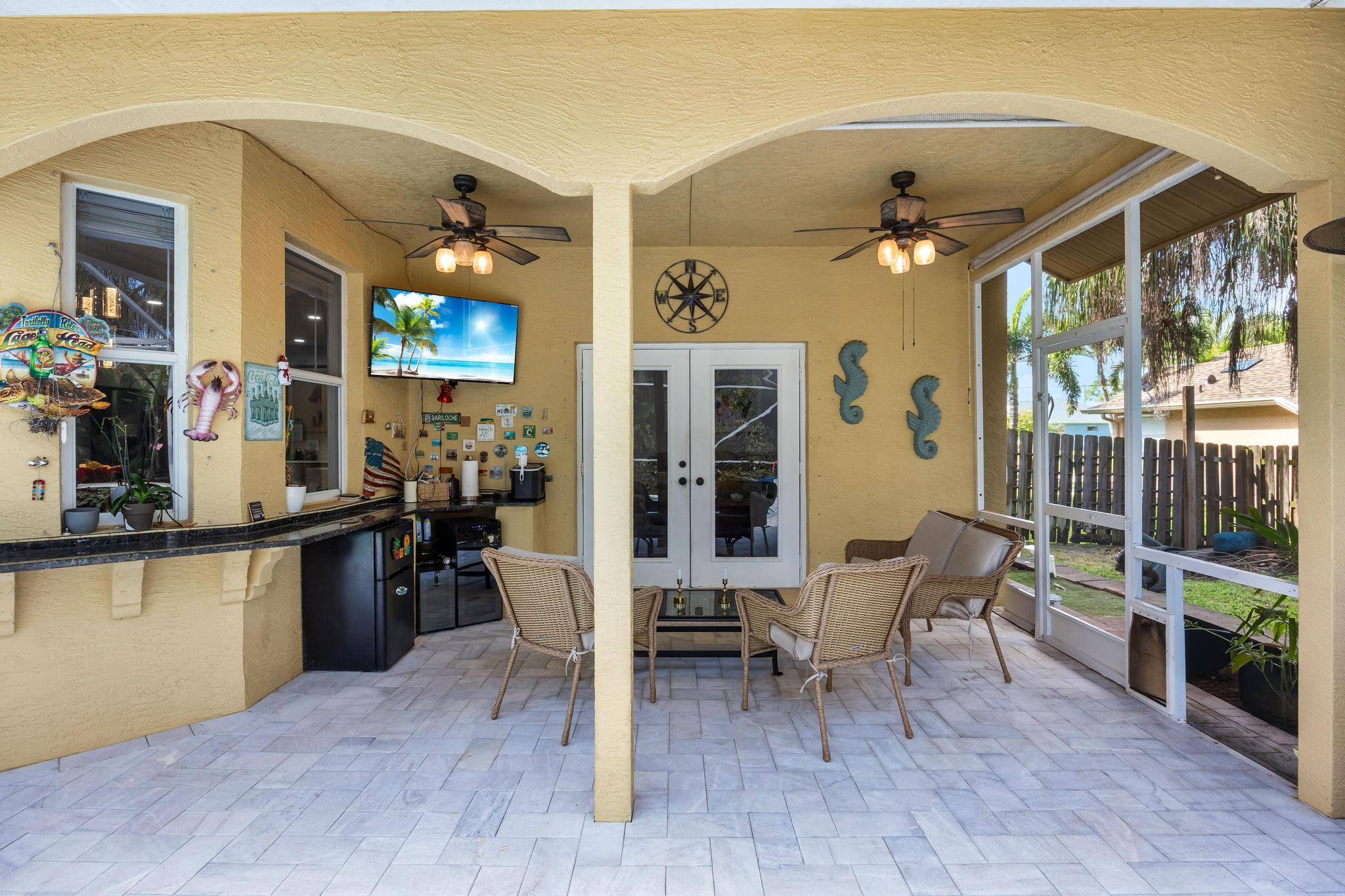 3337 Southwest Crestview Road Port St. Lucie, FL 34953 - Photo 48 of 86 a view of a dining room with furniture and chandelier