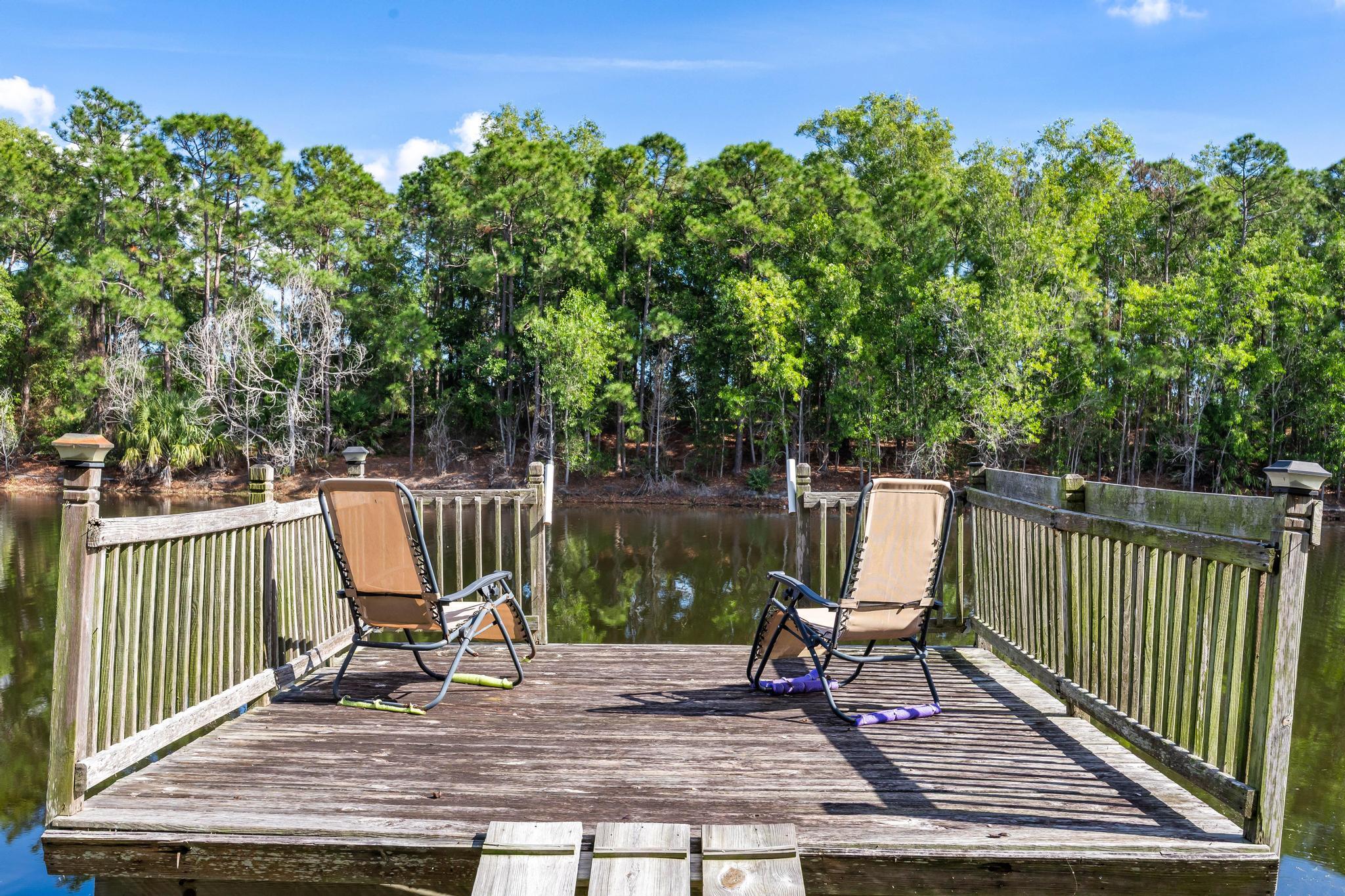 3337 Southwest Crestview Road Port St. Lucie, FL 34953 - Photo 65 of 86 a view of a wooden chairs and bench in the balcony