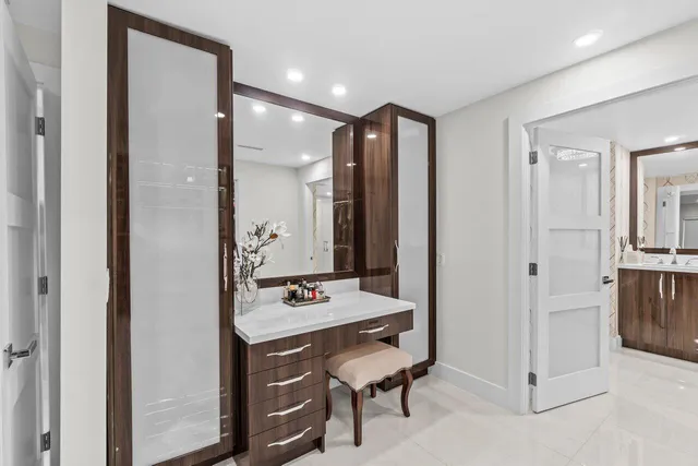 a bathroom with a shower and a sink