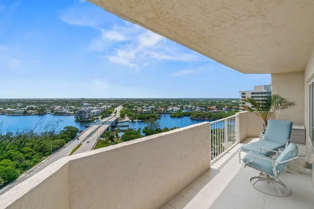 a view of a lake with a building in the background
