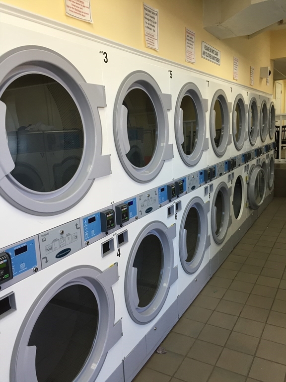1607 Commonwealth Avenue, Unit 14 Boston, MA 02135 - Photo 10 of 11 a utility room with dryer and washer