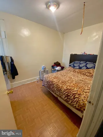 a room with furniture toys and a window