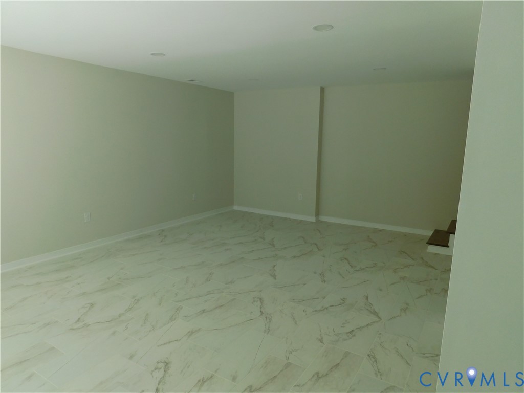 5322 Adams Road Quinton, VA 23141 - Photo 40 of 56 Spacious room featuring light-toned walls, recesse