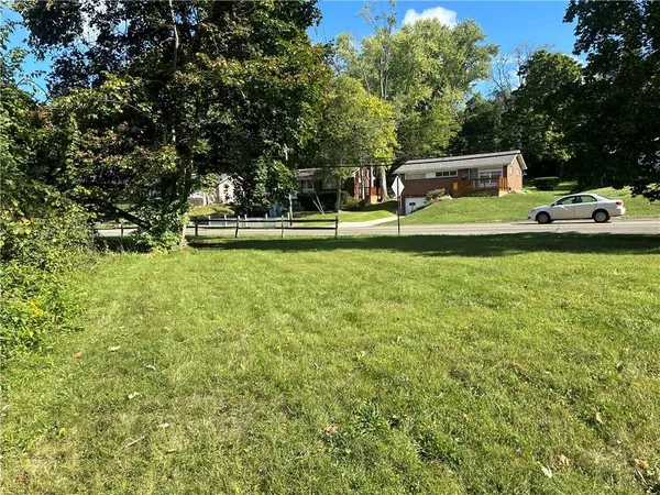 a view of a garden with trees
