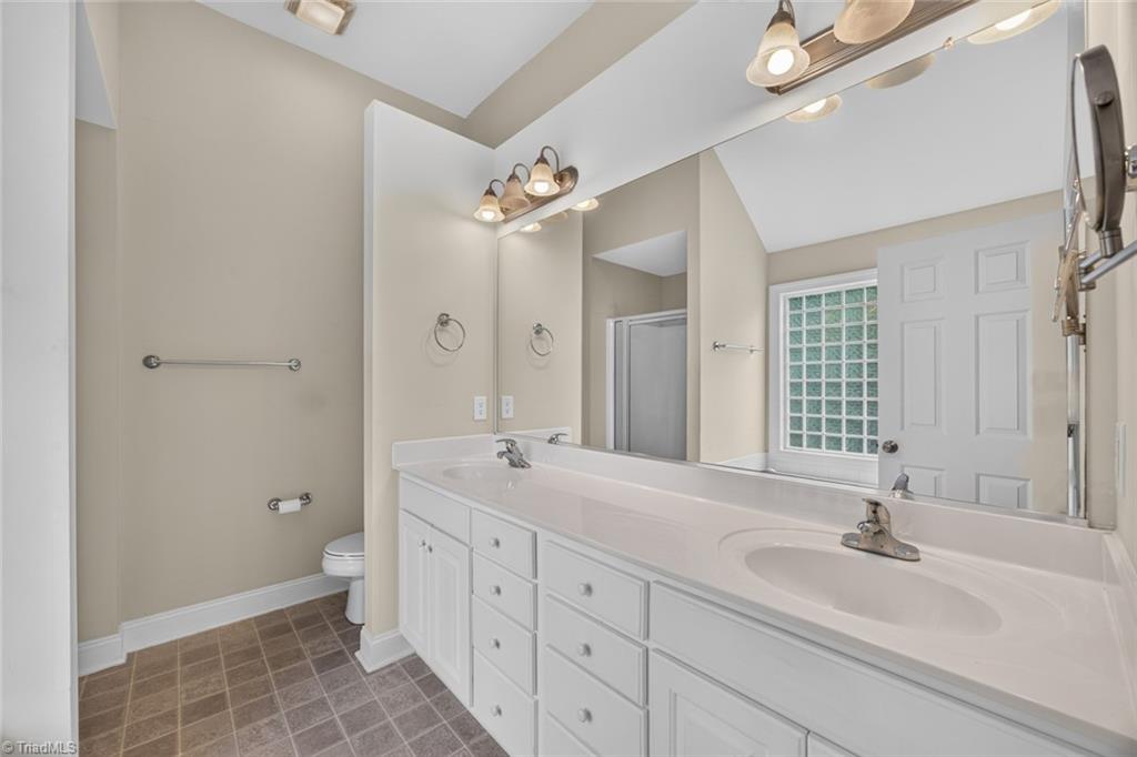 4101 Ballard Farm Road Colfax, NC 27235 - Photo 27 of 41 primary suite