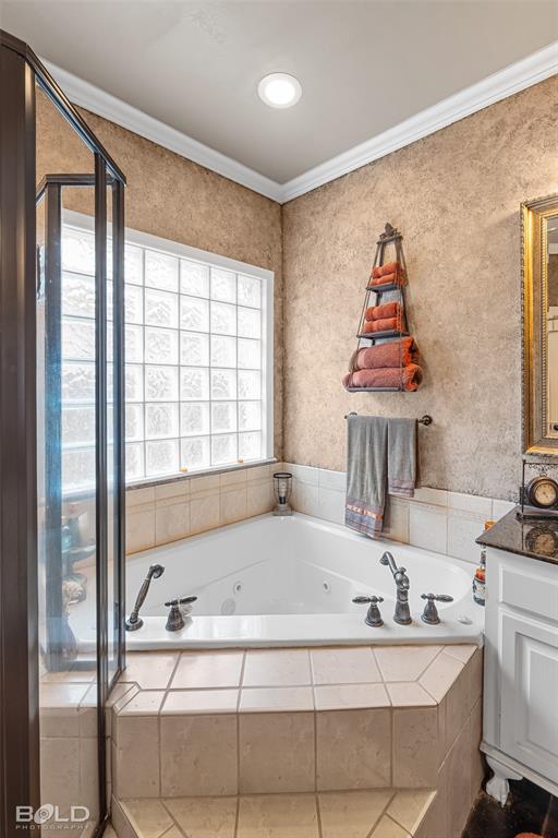 10040 Loveland Court Shreveport, LA 71106 - Photo 16 of 26 a bathroom with a tub sink and mirror