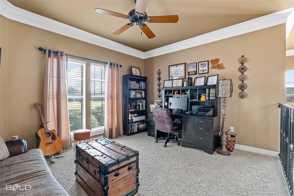 10040 Loveland Court Shreveport, LA 71106 - Photo 22 of 26 a living room with furniture and a window