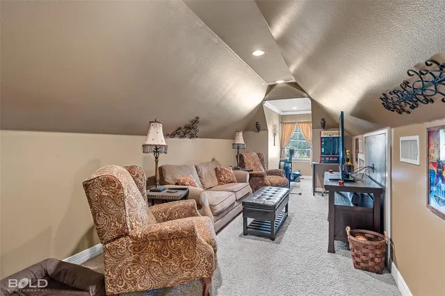 a kitchen with stainless steel appliances granite countertop a stove and a microwave