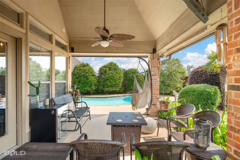 10040 Loveland Court Shreveport, LA 71106 - Photo 6 of 26 a view of a patio with couches chairs and plants