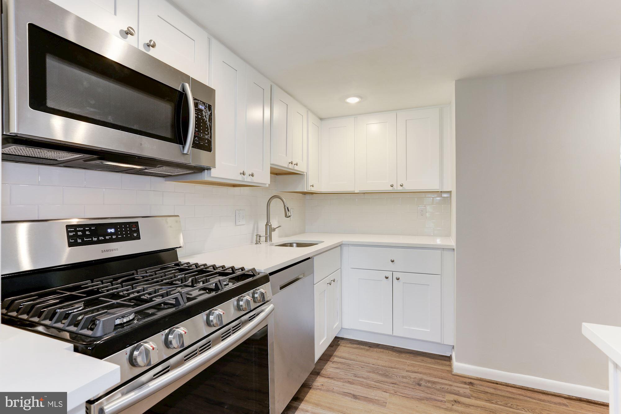 1524 Northgate Square, Unit 11B Reston, VA 20190 - Photo 6 of 22 Fully remodeled kitchen