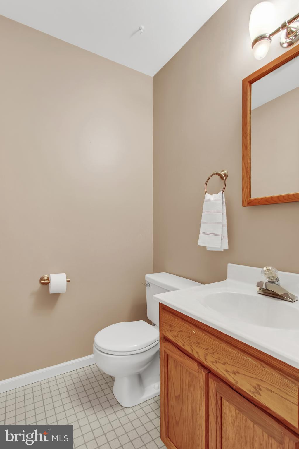 24 Winding Way Lititz, PA 17543 - Photo 12 of 27 a white toilet sitting next to a bathroom sink