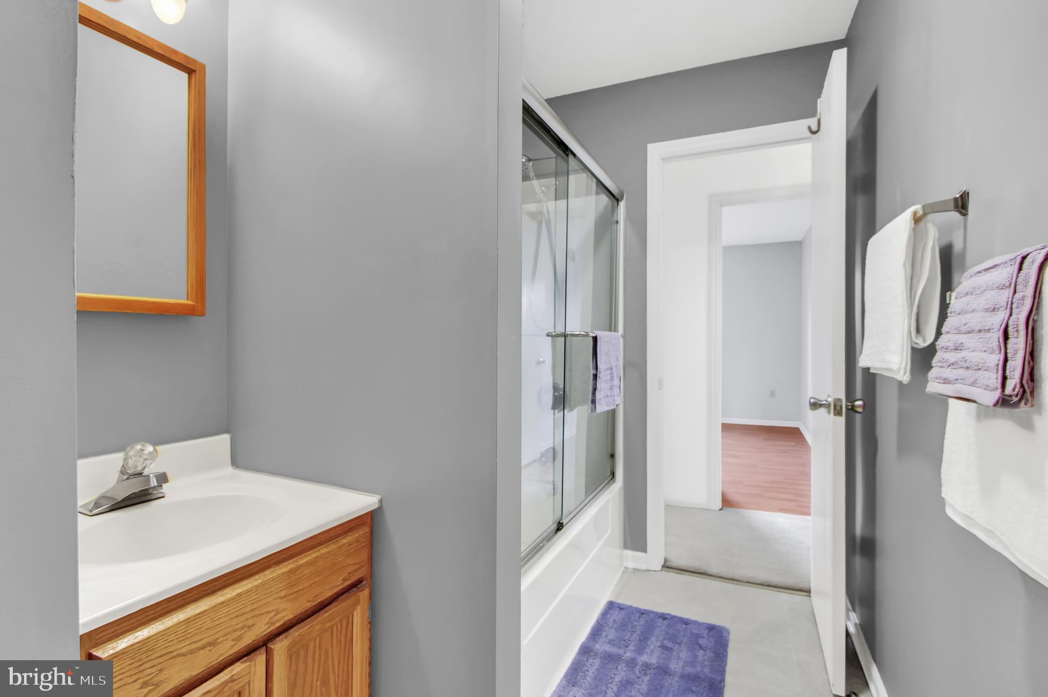 24 Winding Way Lititz, PA 17543 - Photo 19 of 27 a bathroom with a sink and a mirror