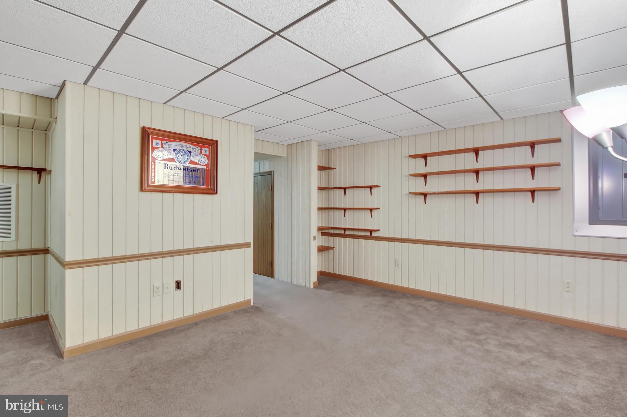 24 Winding Way Lititz, PA 17543 - Photo 21 of 27 a view of a livingroom with shelves