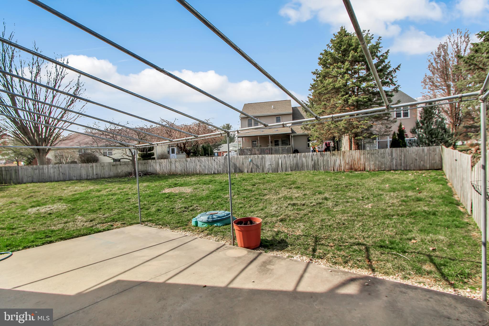 24 Winding Way Lititz, PA 17543 - Photo 22 of 27 a view of a house with a yard and potted plants