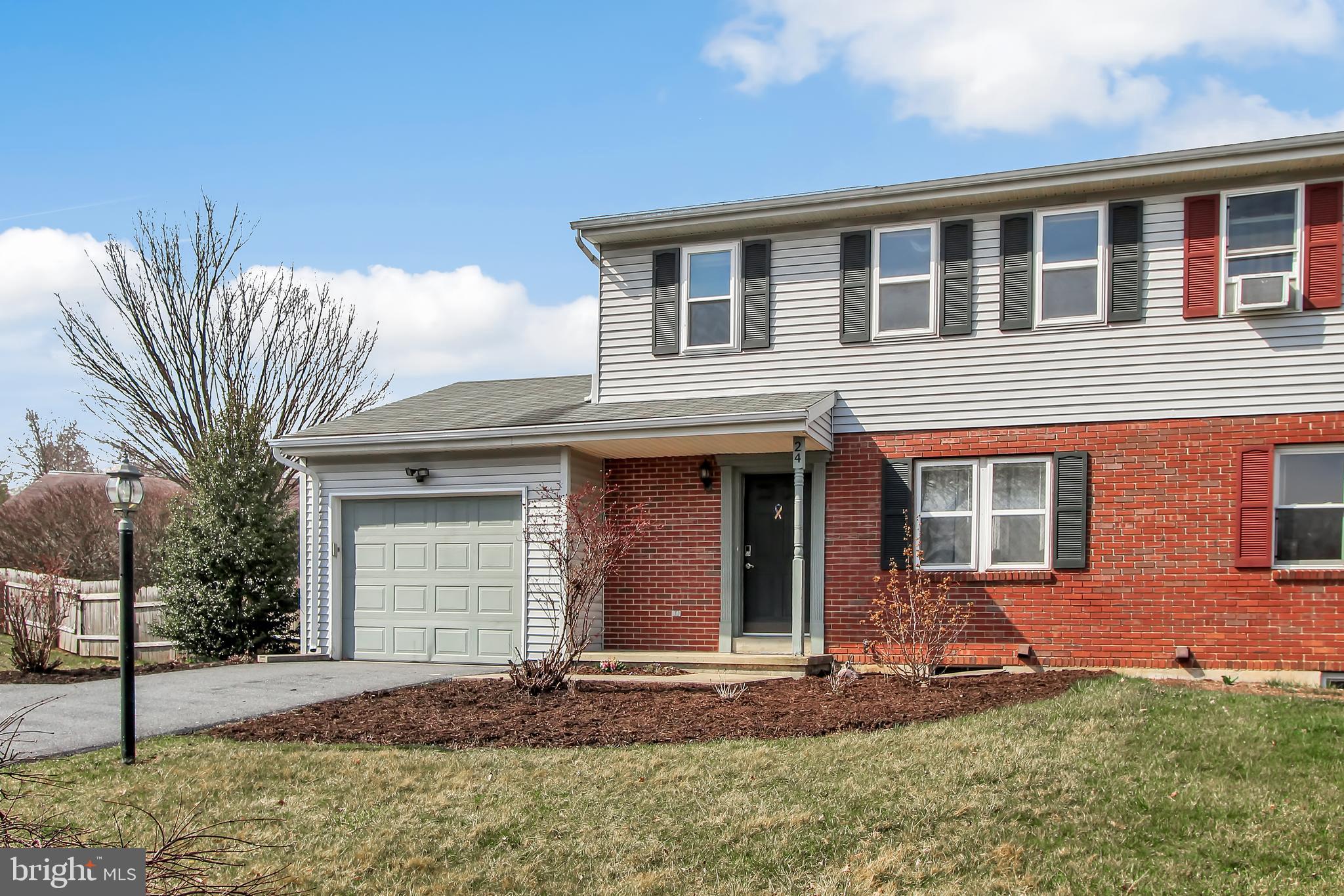 24 Winding Way Lititz, PA 17543 - Photo 27 of 27 a front view of a house with a yard
