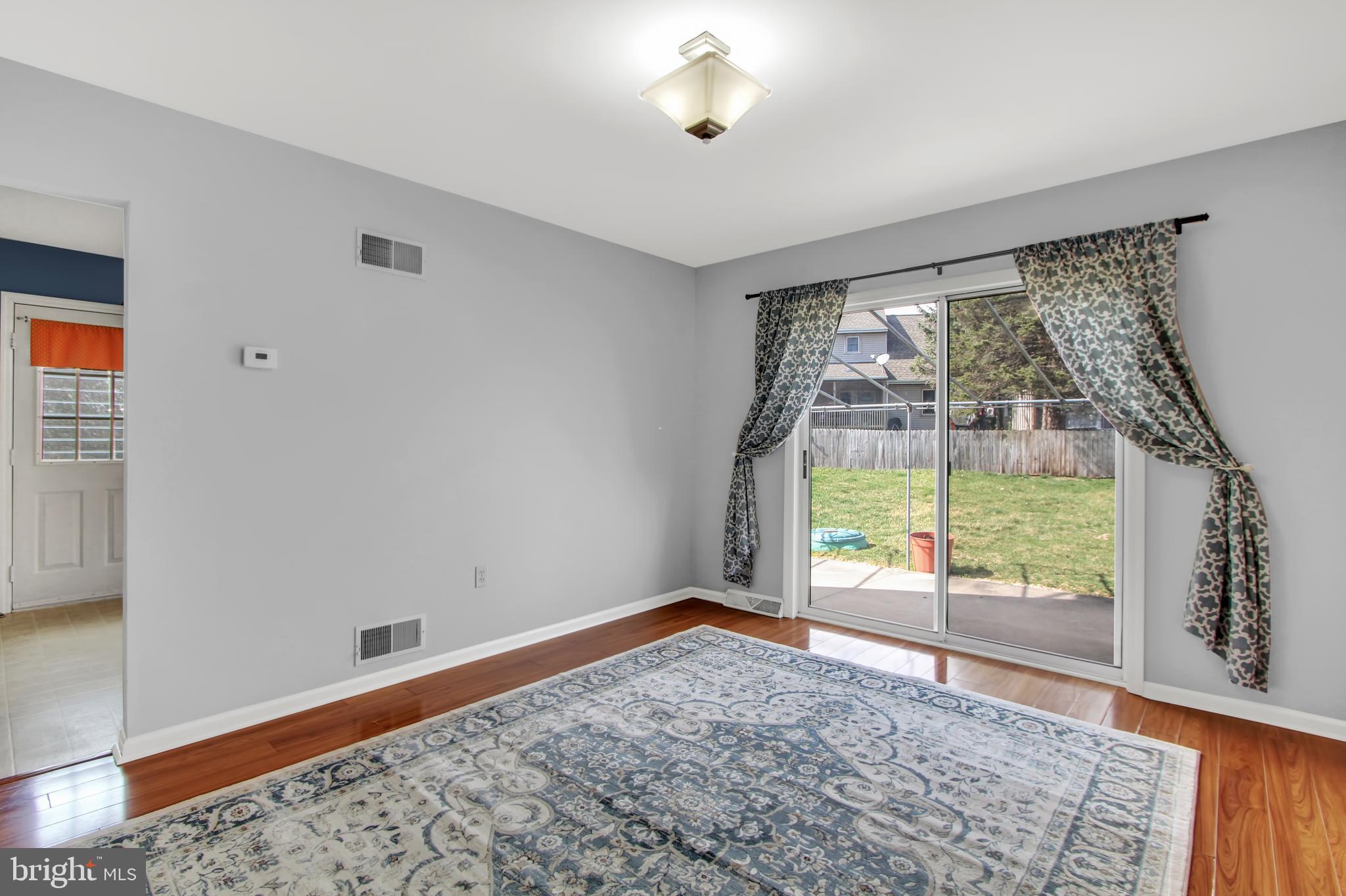 24 Winding Way Lititz, PA 17543 - Photo 7 of 27 wooden floor in an empty room with a window