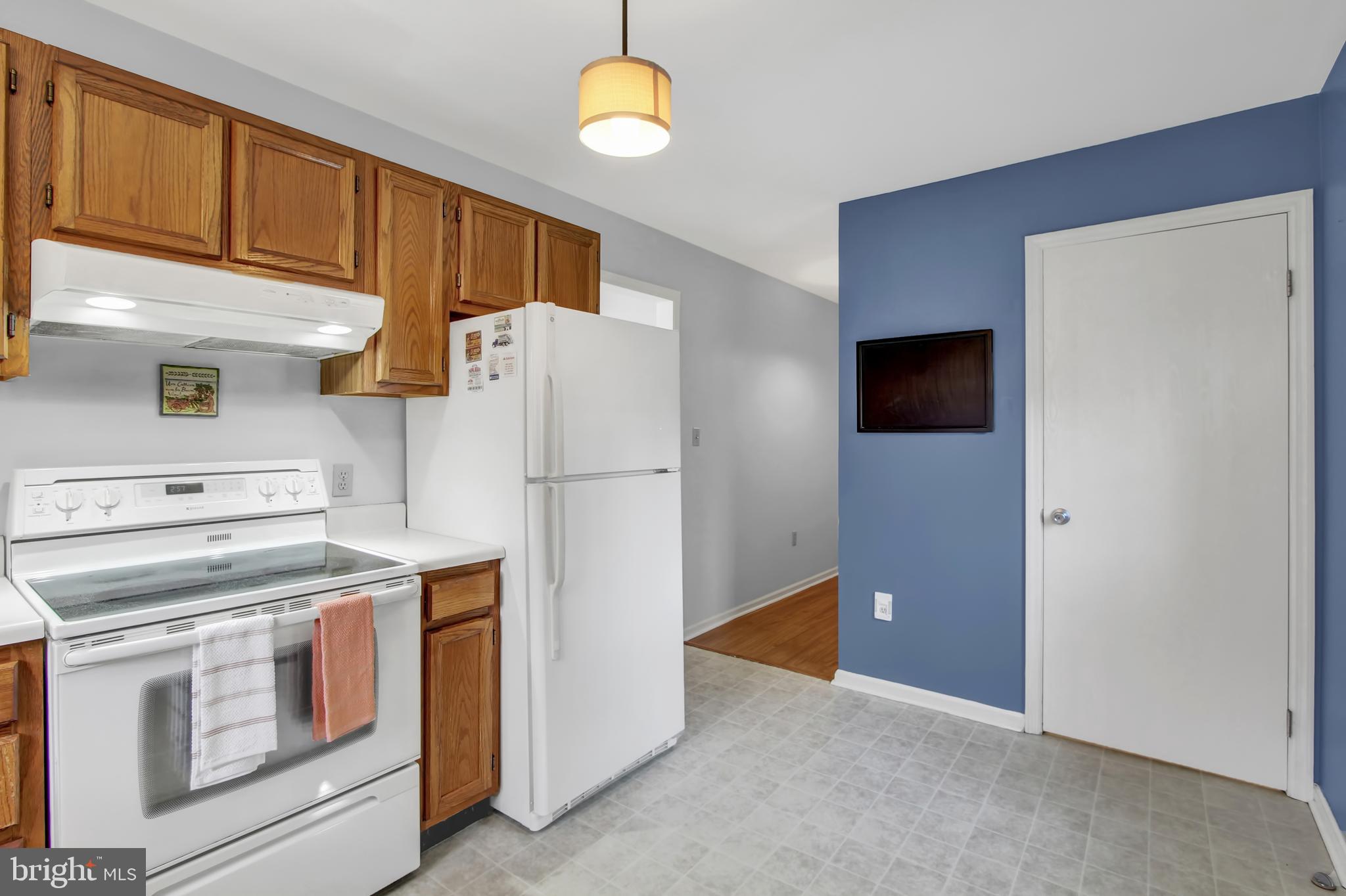 24 Winding Way Lititz, PA 17543 - Photo 10 of 27 a kitchen with a refrigerator sink and cabinets