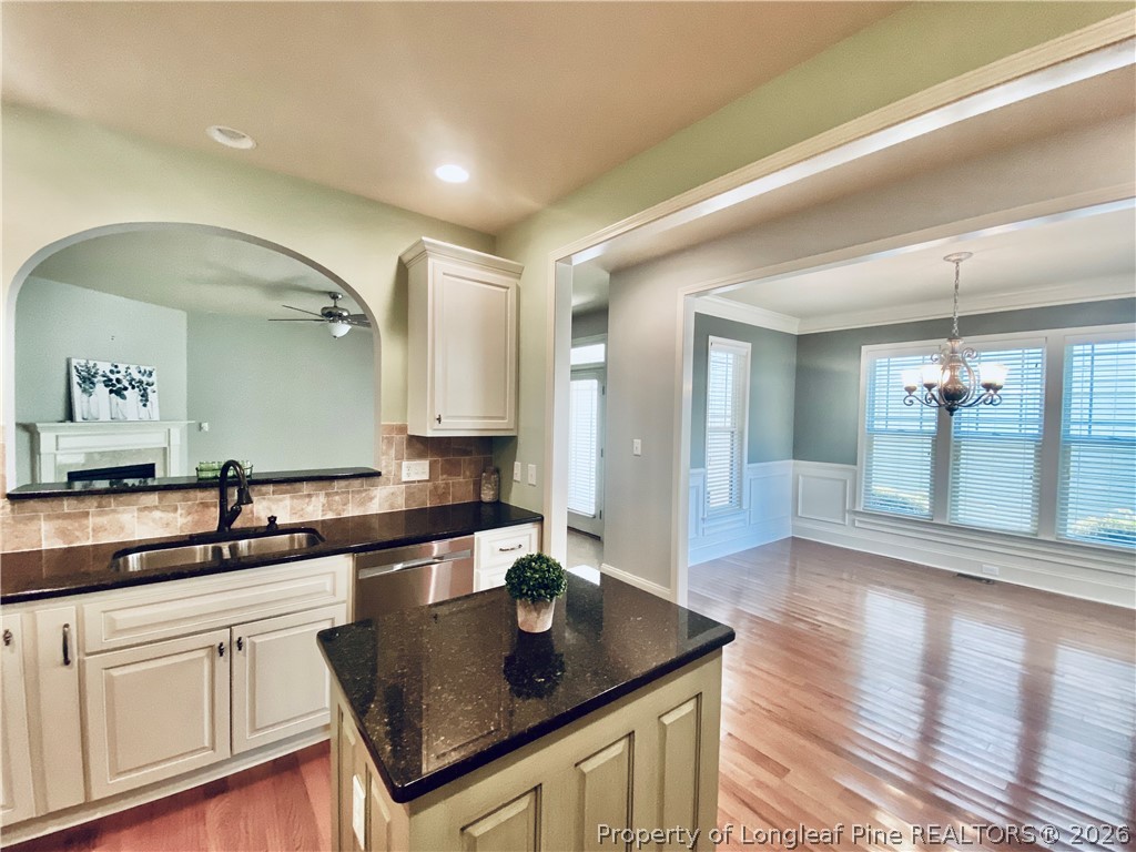 175 Pine Hawk Drive Spring Lake, NC 28390 - Photo 13 of 43 a kitchen with stainless steel appliances granite countertop a sink a stove and a granite counter tops