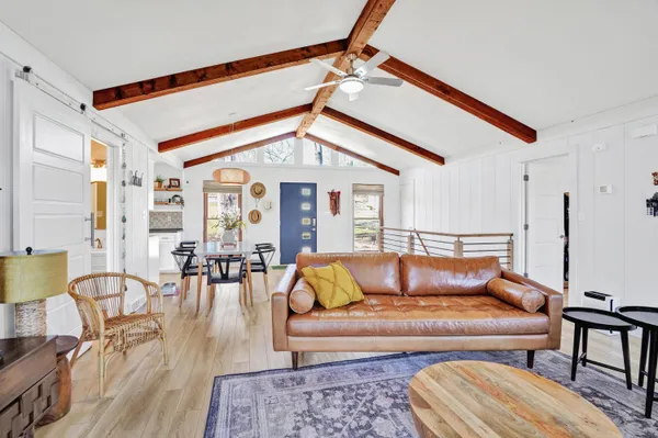 a kitchen with stainless steel appliances granite countertop a sink and a stove top oven