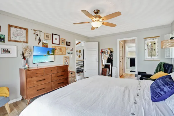 a bathroom with a double vanity sink a mirror and shower