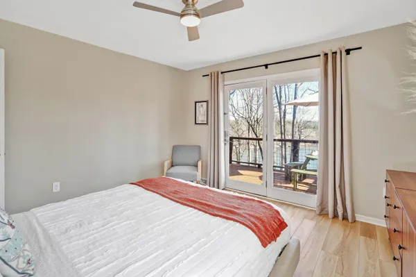 a bathroom with a toilet a sink and a mirror