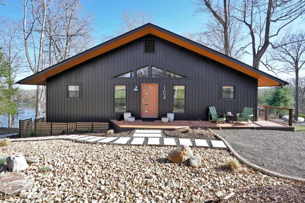 a view of a house with snow on the roof