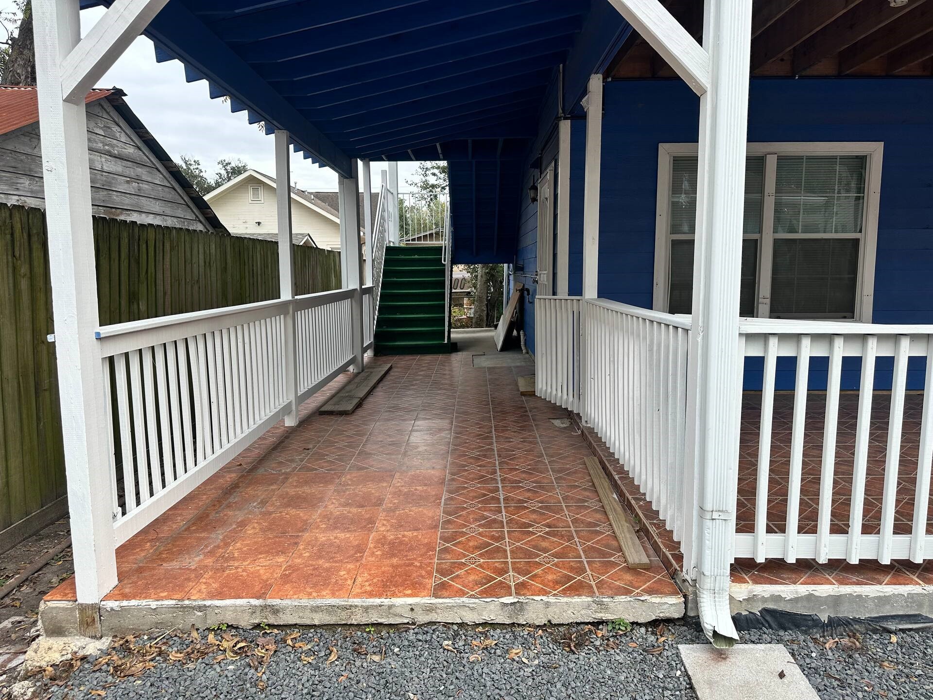 15 Stiles Street Houston, TX 77011 - Photo 17 of 33 a view of a porch with wooden floor and fence