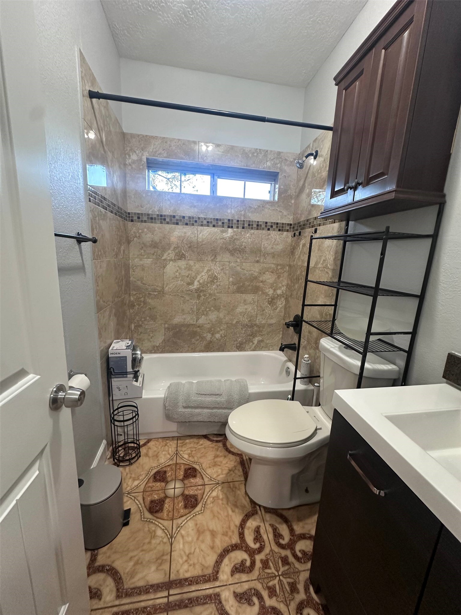 15 Stiles Street Houston, TX 77011 - Photo 30 of 33 a bathroom with a sink and a mirror