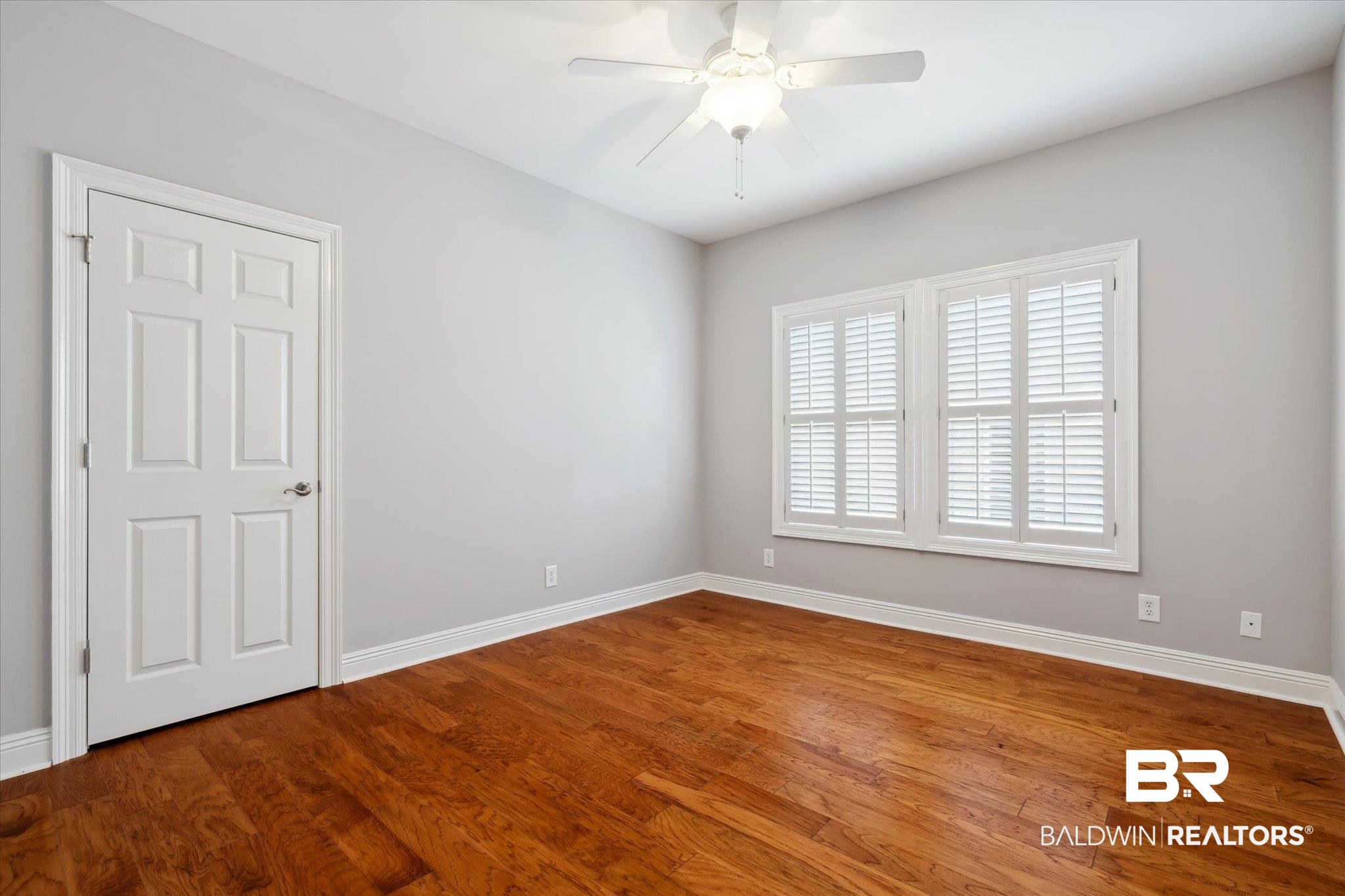 804 Country Club Road Mobile, AL 36609 - Photo 30 of 63 Spare room featuring hardwood / wood-style flooring and ceiling fan