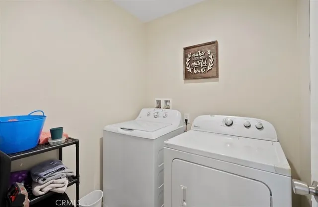 a bedroom with a bed and cabinets