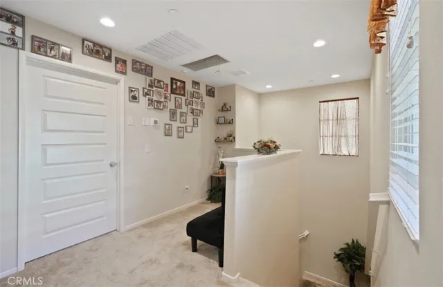 a bedroom with bed and a couch