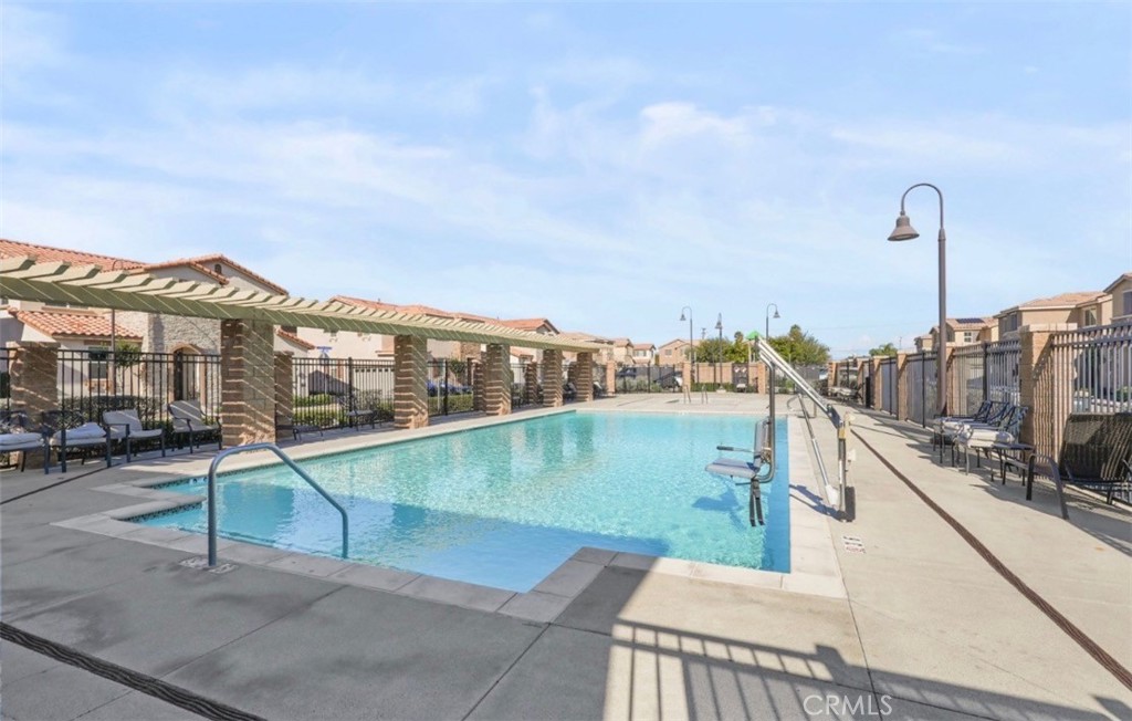 2248 Ridge Court Perris, CA 92571 - Photo 36 of 48 a view of a swimming pool with a lake view