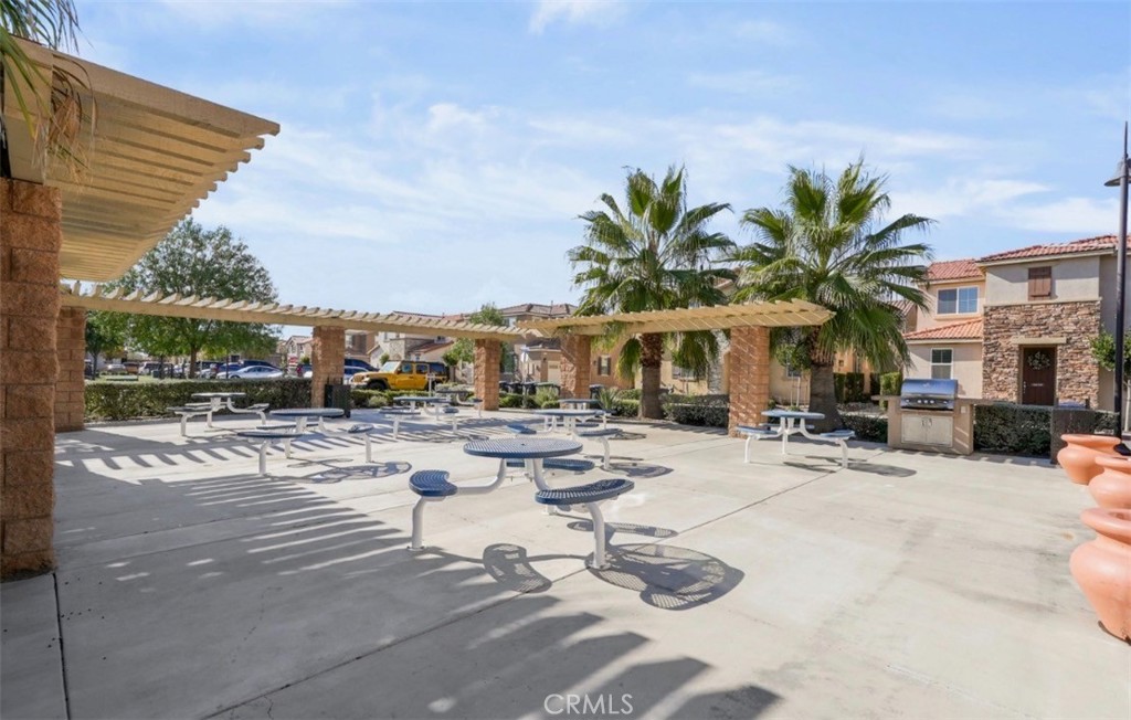 2248 Ridge Court Perris, CA 92571 - Photo 38 of 48 a view of a swimming pool with furniture