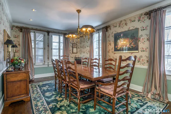 a view of a dining room with furniture window and outside view