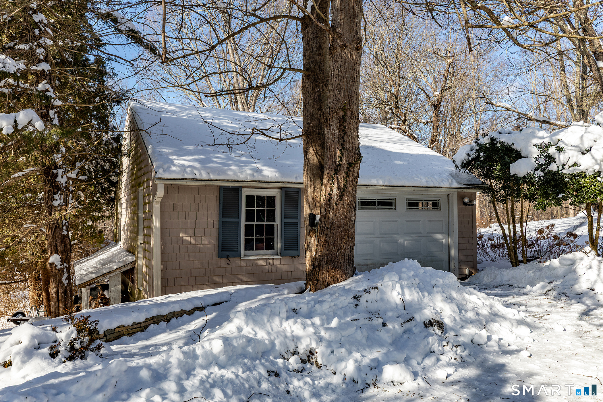 46 Spooner Hill Road Kent, CT 06757 - Photo 41 of 44 a front view of a house with a yard and garage