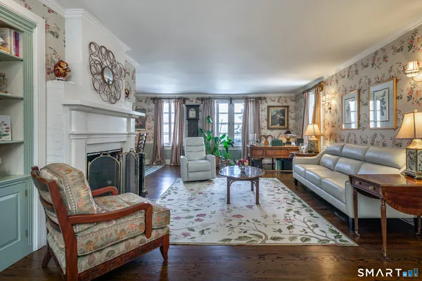 a living room with furniture or couch and a fireplace