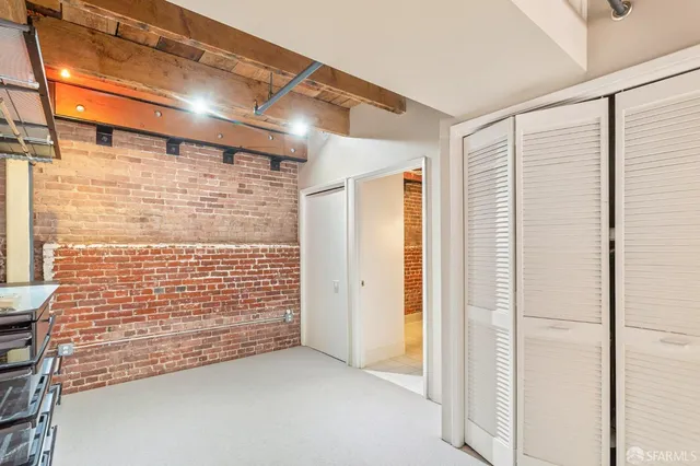 a view of room with furniture and a window
