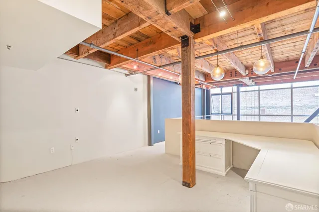 a bathroom with a shower and toilet