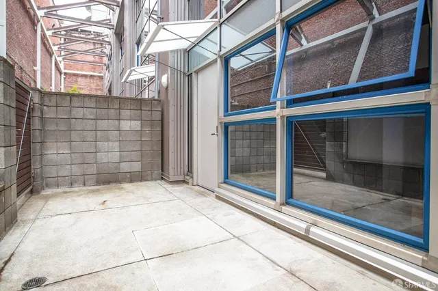 a view of a garage with furniture