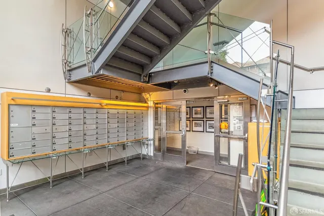 a view of parking garage with cars