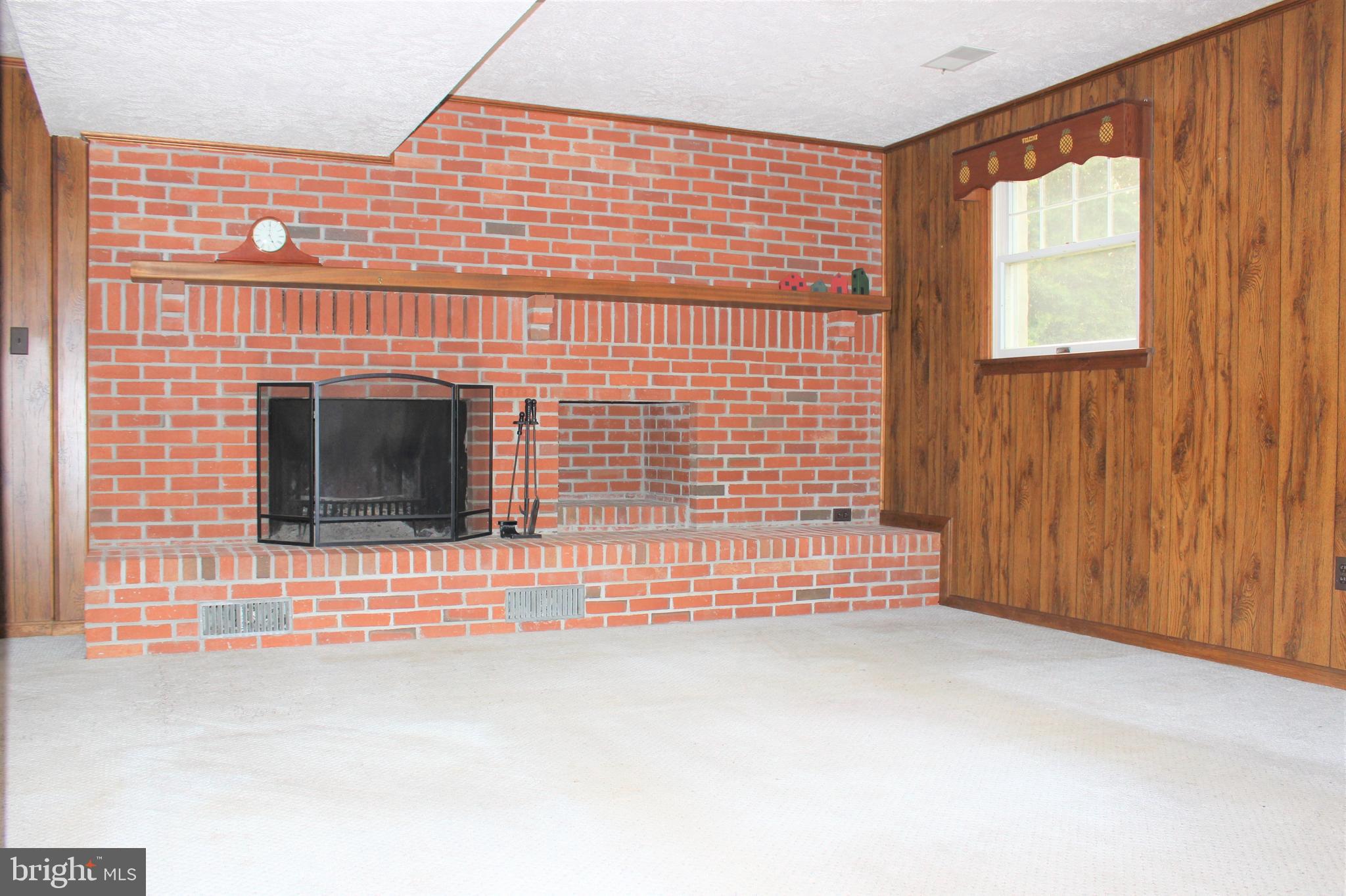 2712 Bachman Road Manchester, MD 21102 - Photo 20 of 45 Large family room with woodburning fireplace