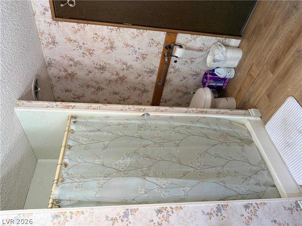 1391 West Dyer Road Pahrump, NV 89048 - Photo 37 of 50 Functional bathroom featuring a shower stall and essential amenities.