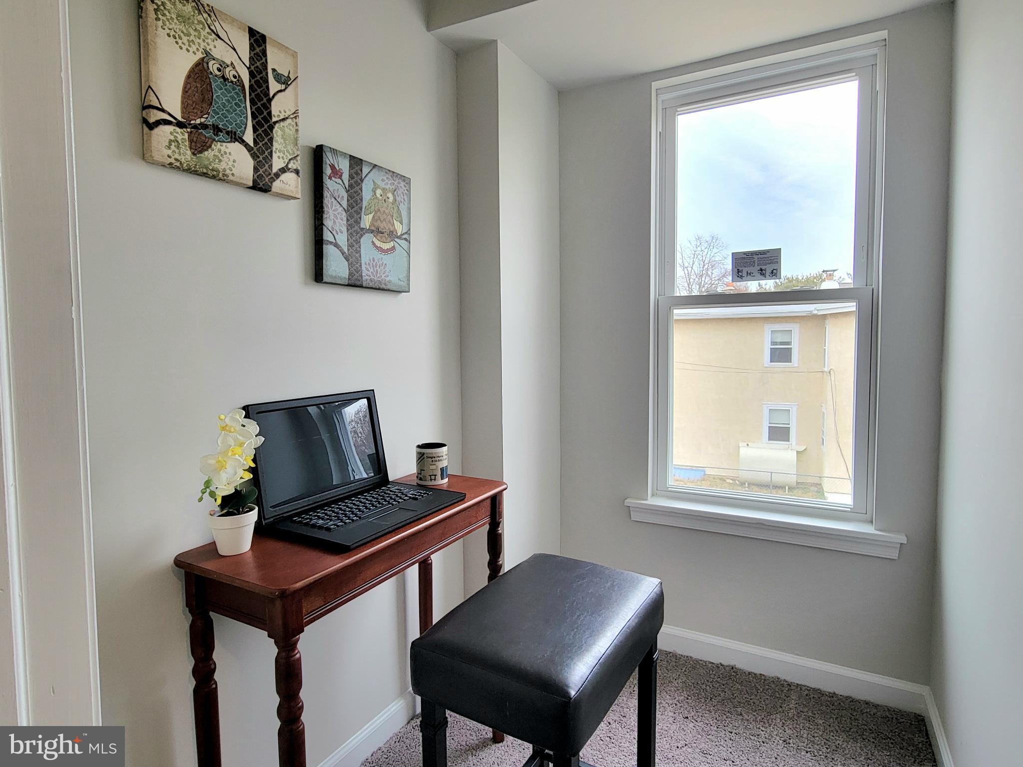 17 West 2nd Street Marcus Hook, PA 19061 - Photo 23 of 38 a living room with a window