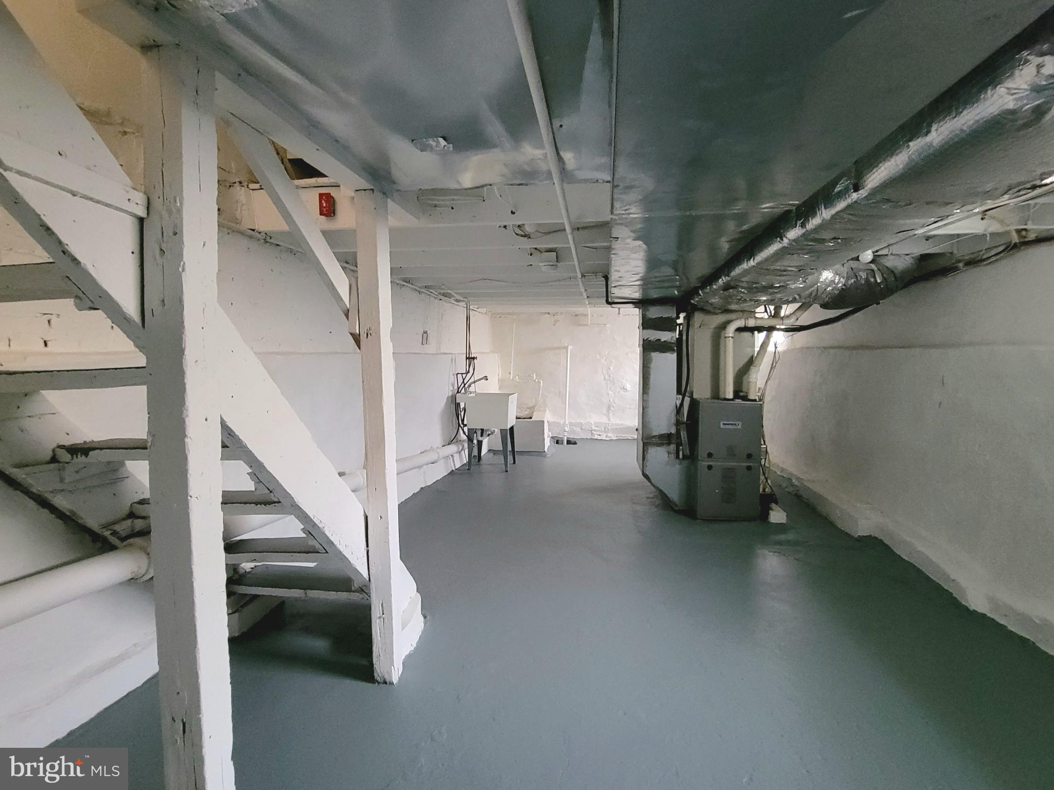 17 West 2nd Street Marcus Hook, PA 19061 - Photo 31 of 38 a view of a hallway with stairs