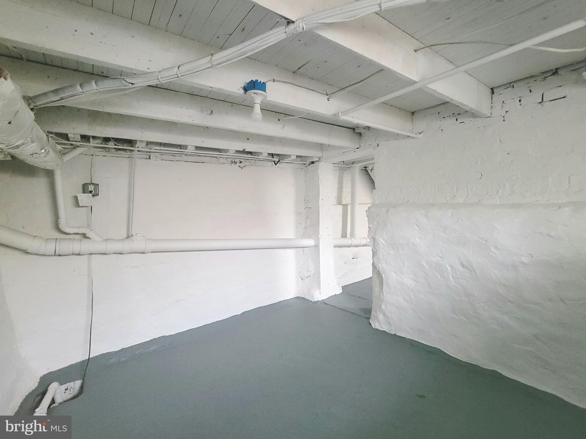 17 West 2nd Street Marcus Hook, PA 19061 - Photo 33 of 38 a view of a room with racks on the wall