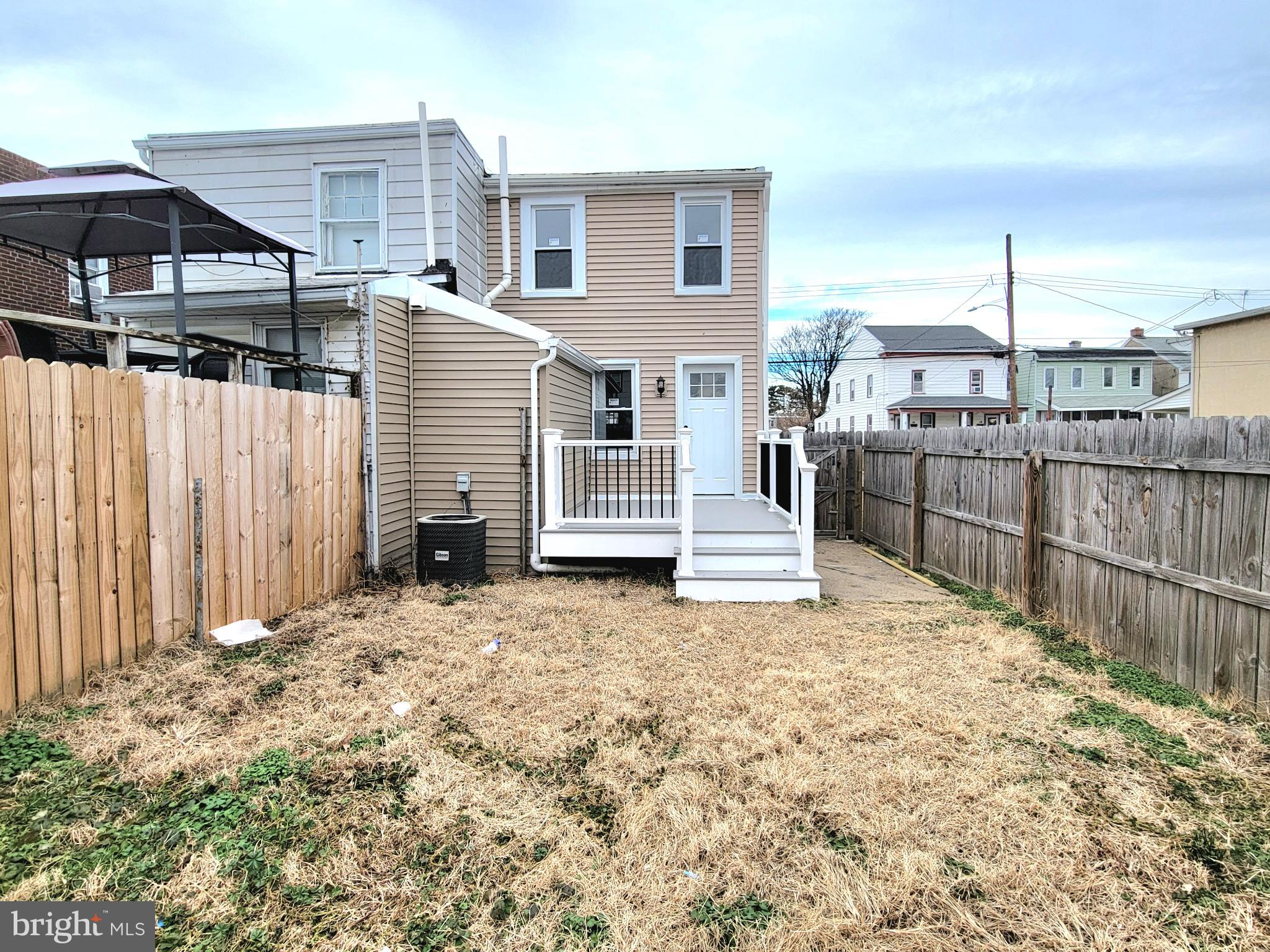 17 West 2nd Street Marcus Hook, PA 19061 - Photo 35 of 38 a backyard of a house with shaded area