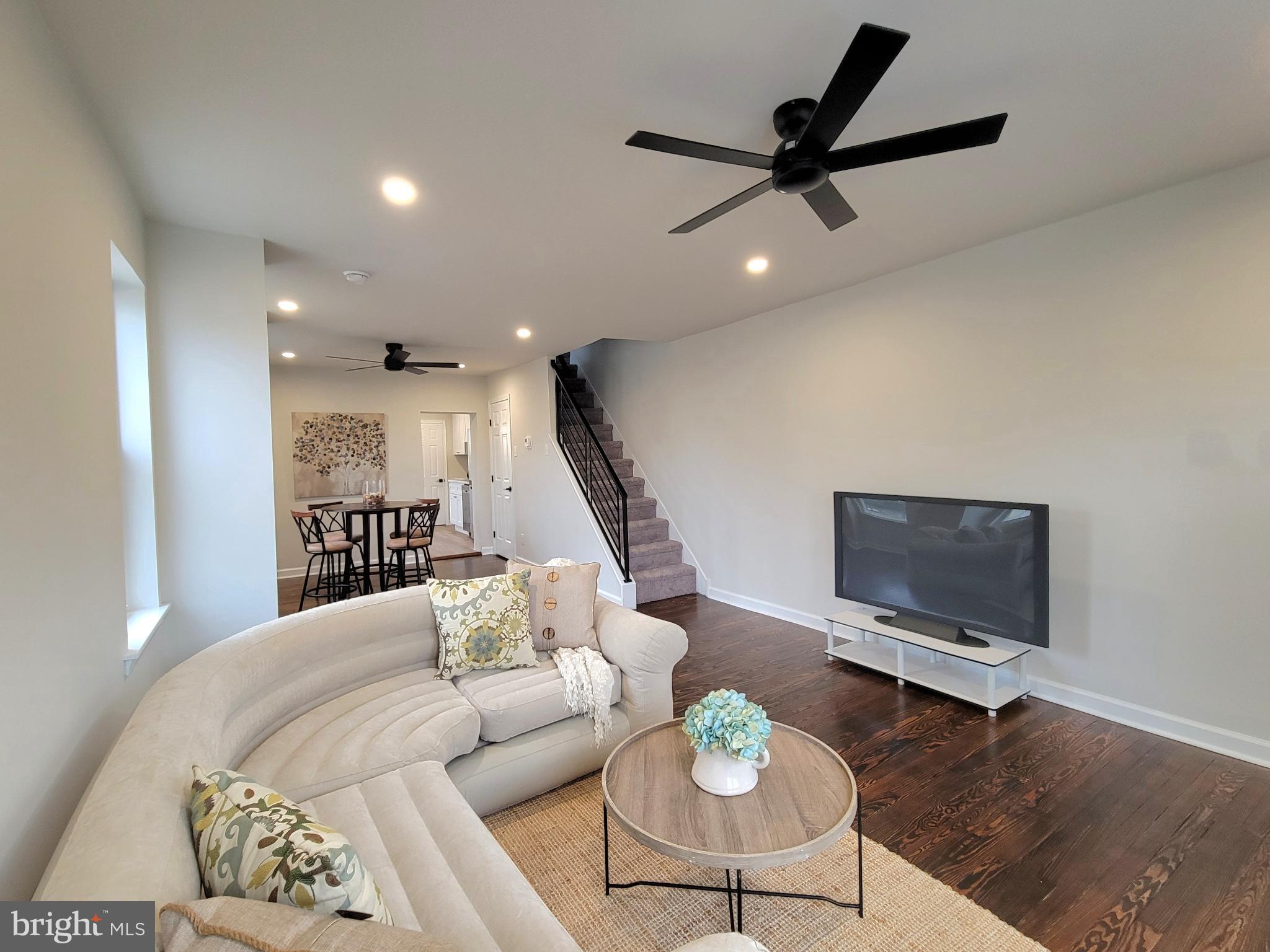 17 West 2nd Street Marcus Hook, PA 19061 - Photo 5 of 38 a living room with furniture and a wooden floor